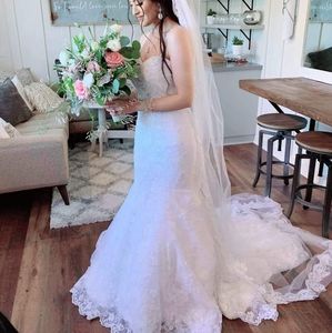 White crystal detailing bridal wedding dress